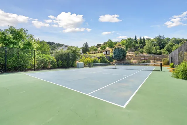 a bath tub sitting next to a window