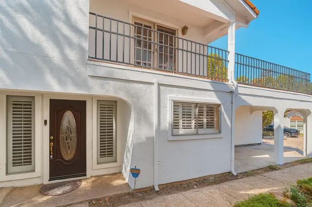 a front view of a house with a door