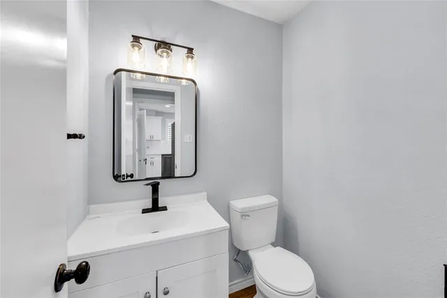 a view of room with wooden floor