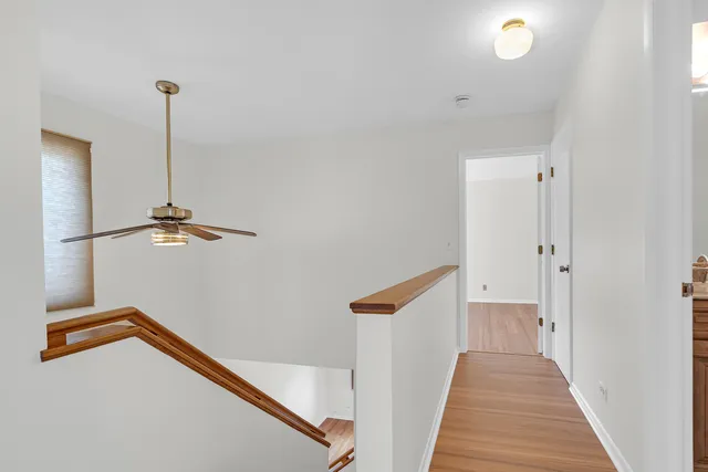 a view of a hallway with staircase