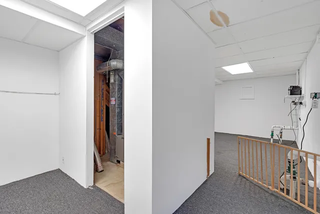 a view of a hallway with closet