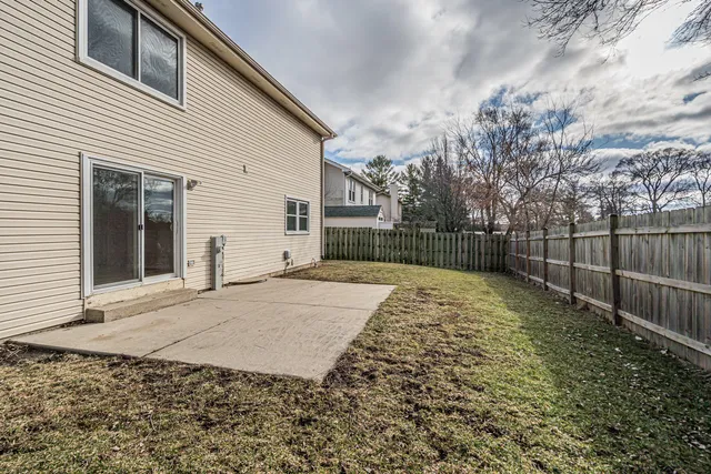 a view of backyard of house