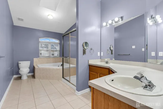 a sign that is sitting in a garden