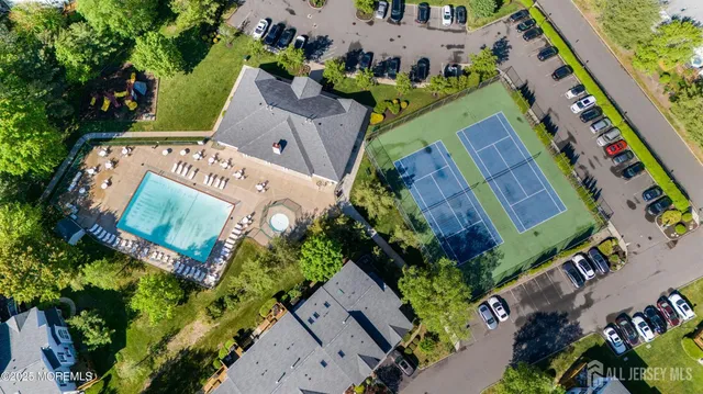 a view of an outdoor space and tennis court