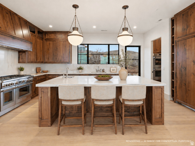 2155 East Wrangler Road Kamas, UT 84036 - Photo 4 of 62 Kitchen featuring a large island with sink, stainless steel appliances, wood finish cabinets, and light wood-style flooring