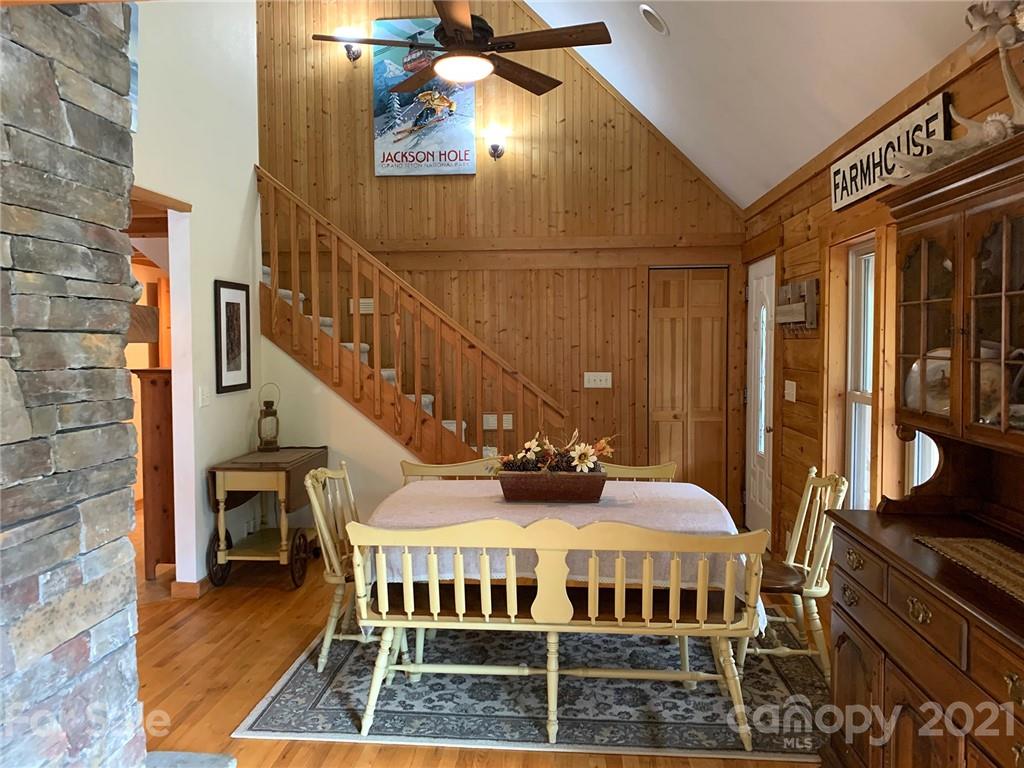 279 Observation Ridge Rutherfordton, NC 28139 - Photo 8 of 32 a view of a balcony with furniture and wooden floor