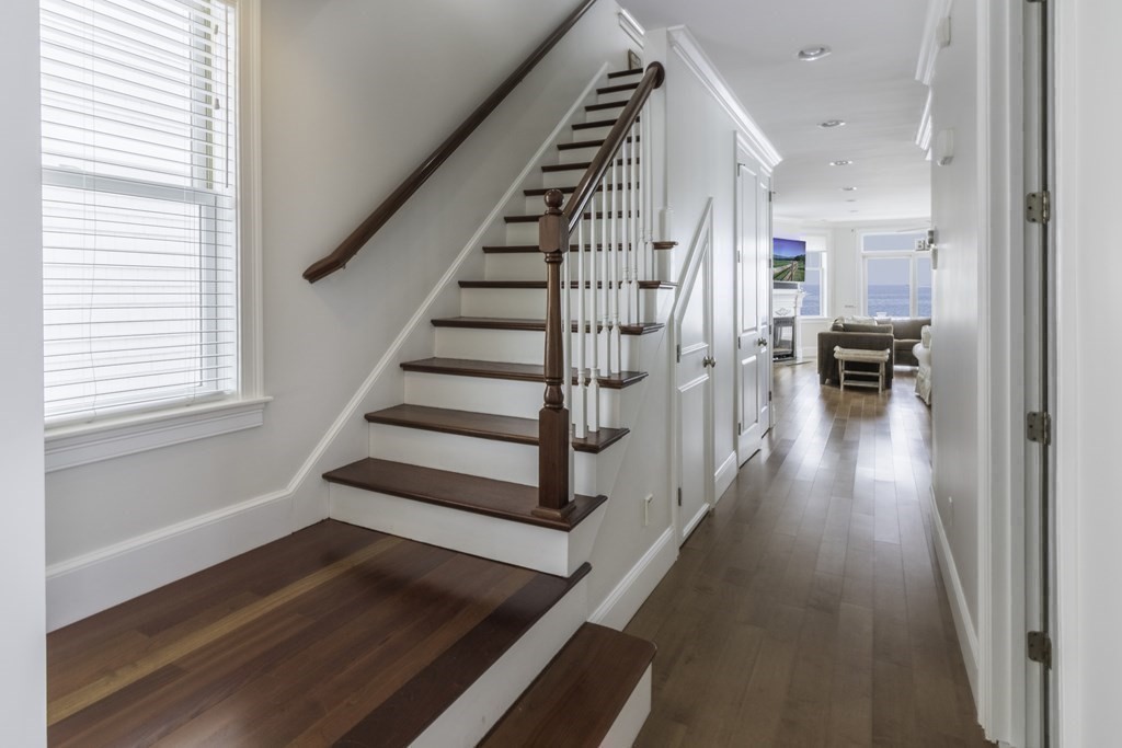 73 K Street Hull, MA 02045 - Photo 19 of 42 a view of entryway and hall with wooden floor