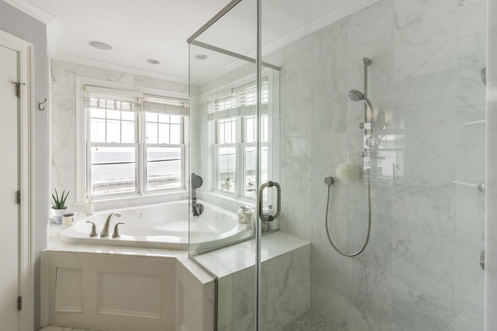 73 K Street Hull, MA 02045 - Photo 22 of 42 a bathroom with a sink and a mirror