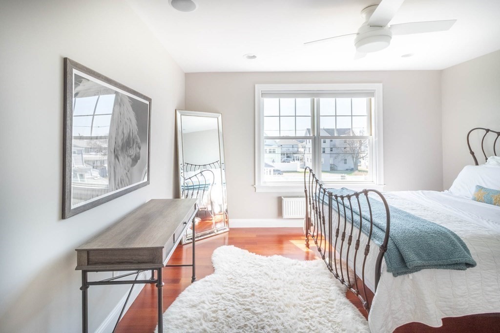 73 K Street Hull, MA 02045 - Photo 25 of 42 a bedroom with furniture and a window