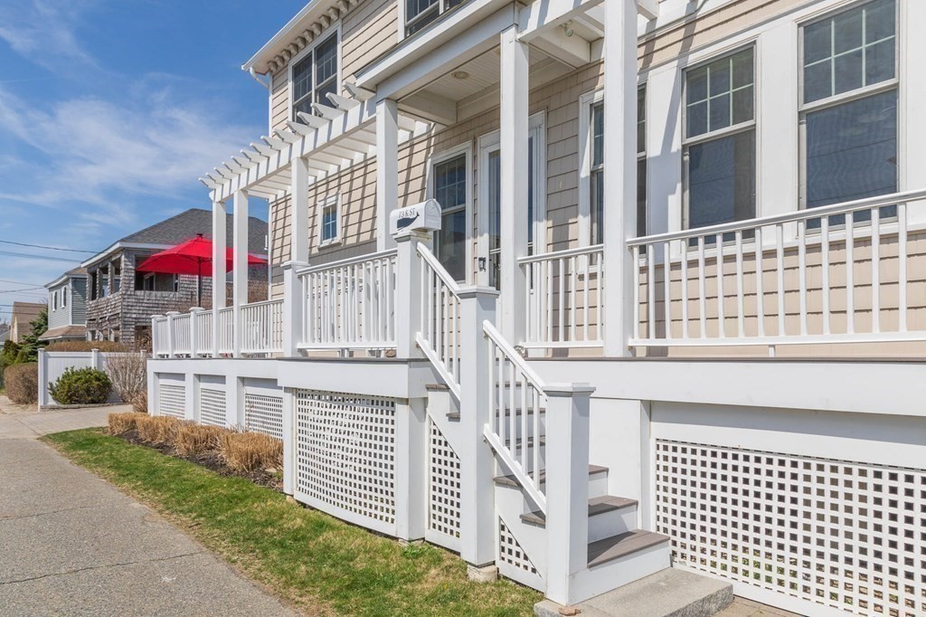 73 K Street Hull, MA 02045 - Photo 4 of 42 a front view of a building with grey walls