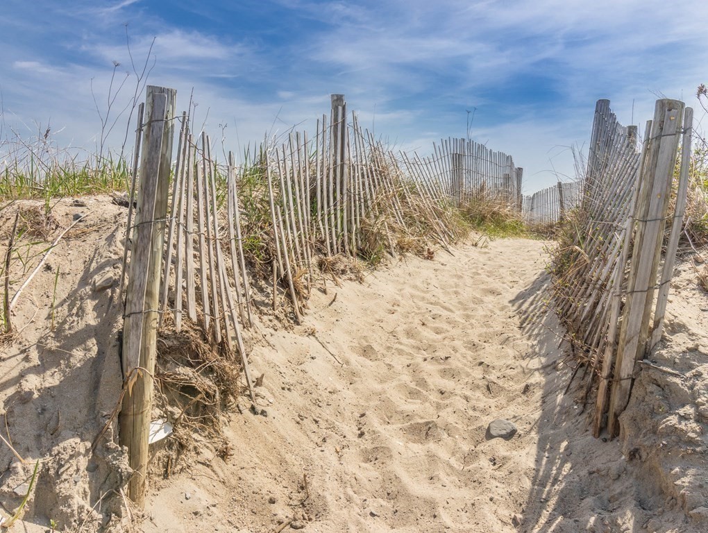 73 K Street Hull, MA 02045 - Photo 41 of 42 a view of a yard with wooden fence