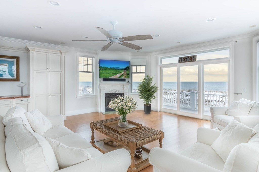 73 K Street Hull, MA 02045 - Photo 10 of 42 a living room with furniture and a large window