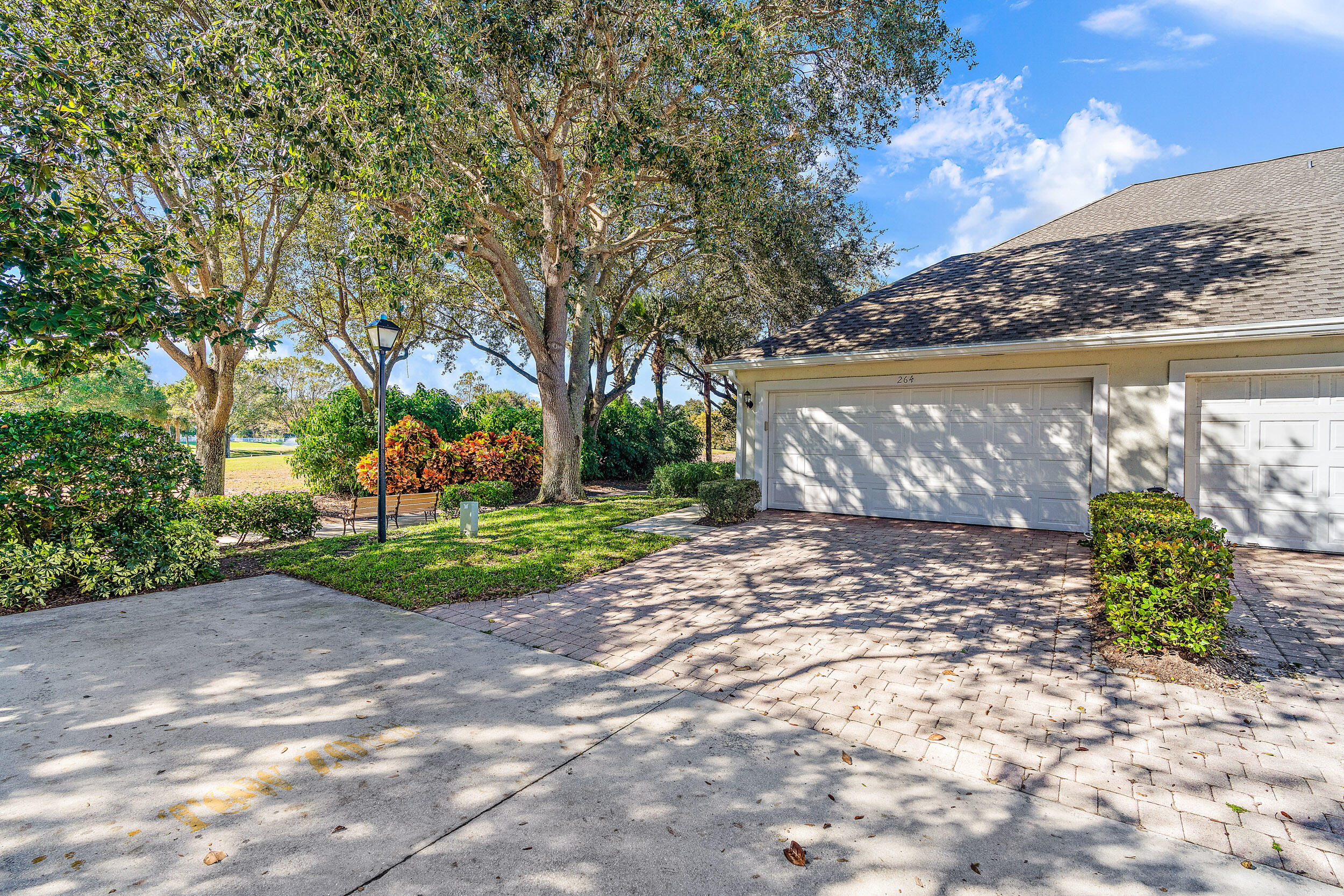 264 Murray Court Jupiter, FL 33458 - Photo 28 of 37 Garage / Back Exterior