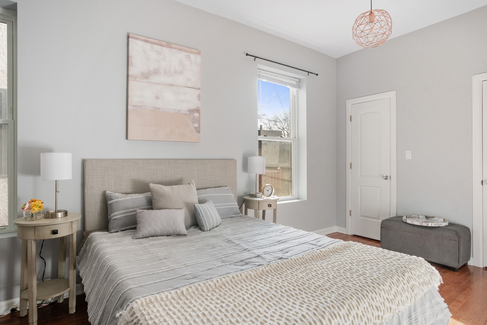 5556 North Wayne Avenue Chicago, IL 60640 - Photo 12 of 37 a bedroom with a bed and a window