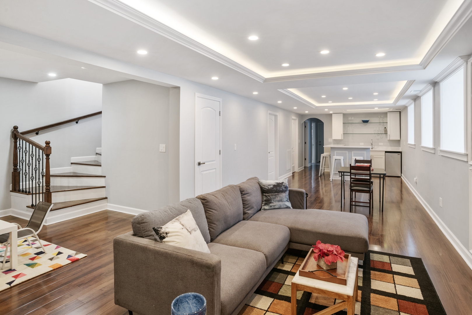 5556 North Wayne Avenue Chicago, IL 60640 - Photo 18 of 37 a living room with furniture and wooden floor