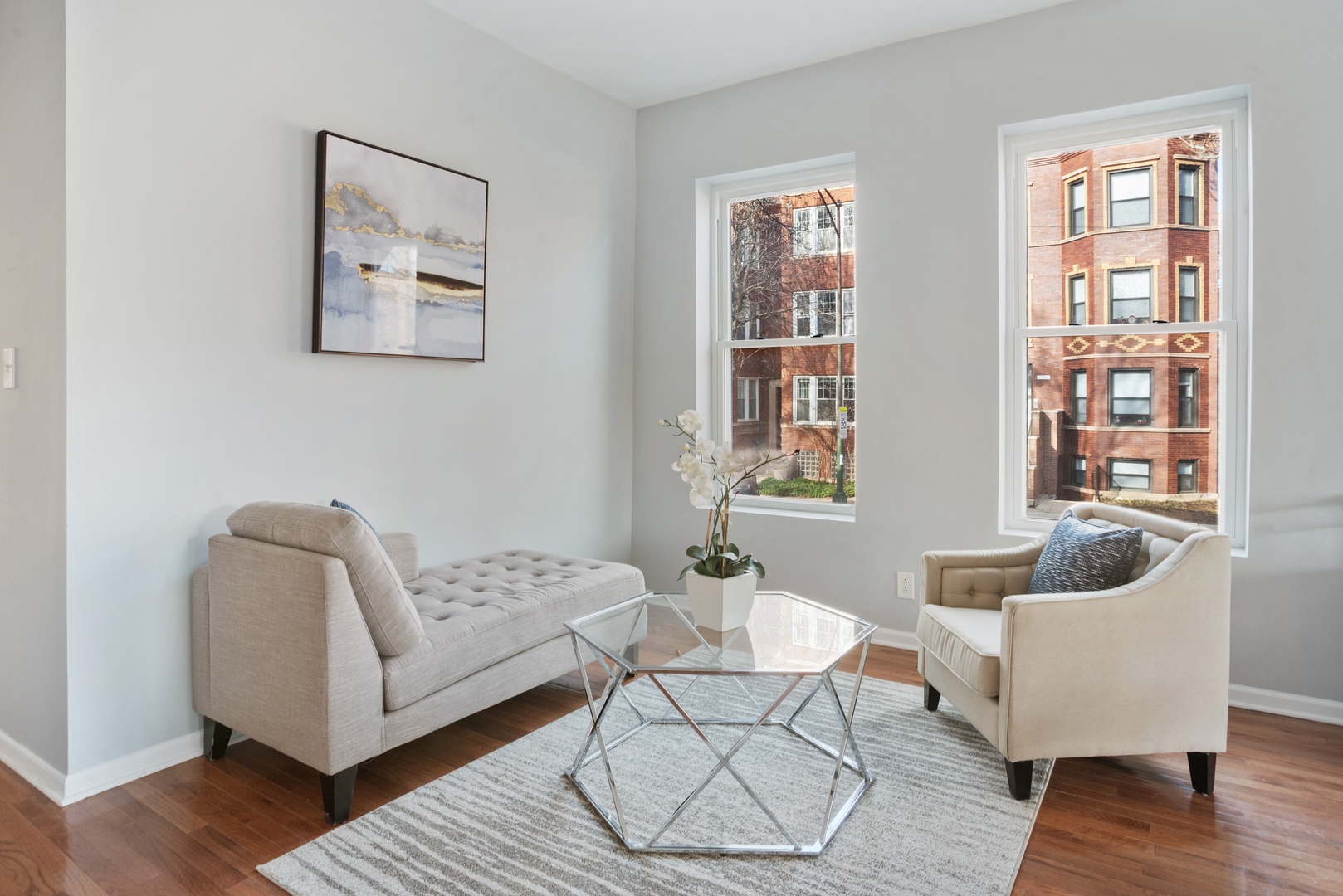 5556 North Wayne Avenue Chicago, IL 60640 - Photo 6 of 37 a living room with furniture and a potted plant