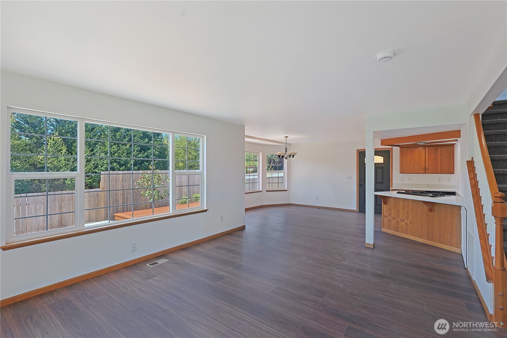 3618 Chrisella Road East Edgewood, WA 98371 - Photo 12 of 33 wooden floor in an empty room with a window