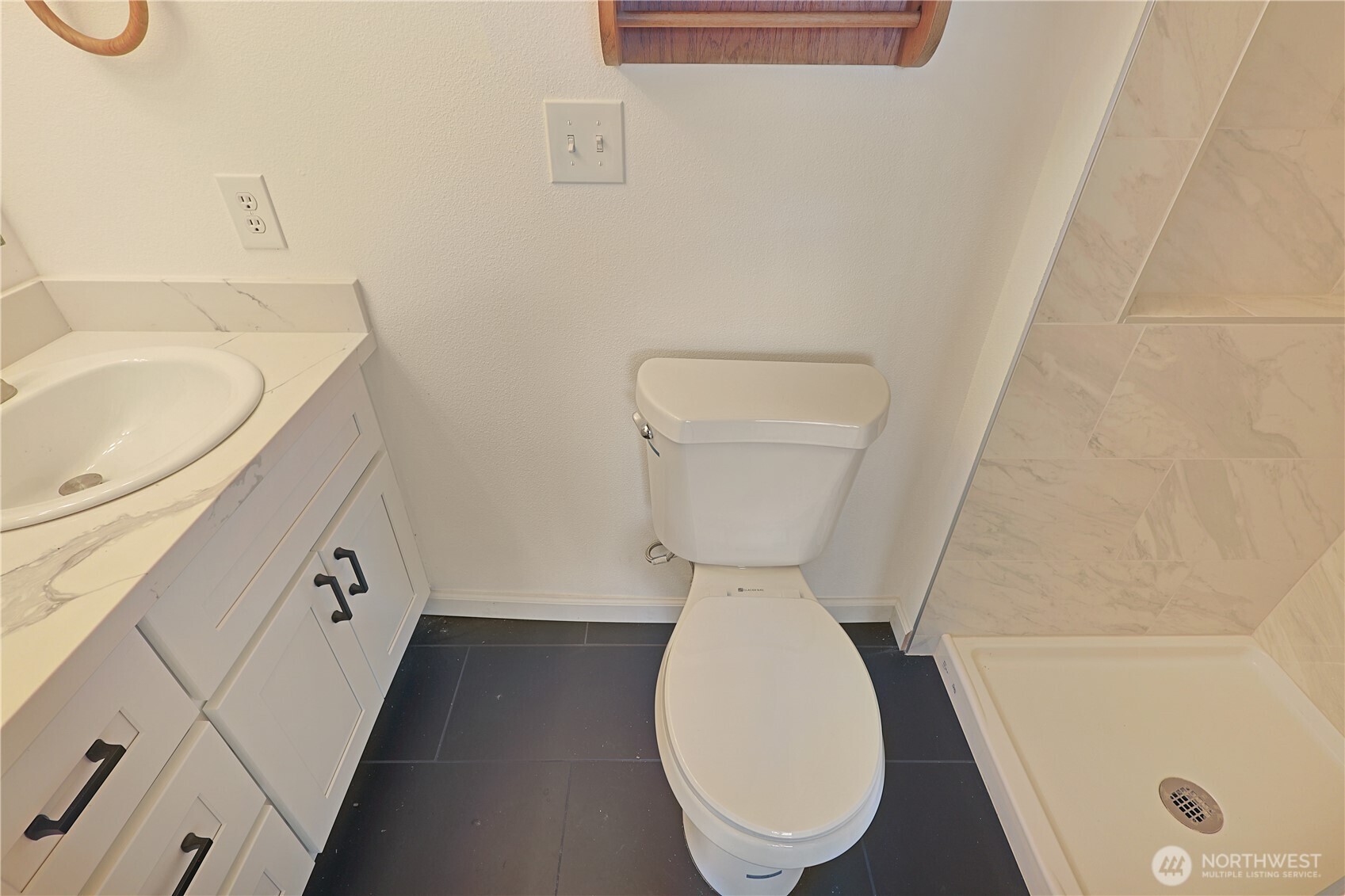 3618 Chrisella Road East Edgewood, WA 98371 - Photo 14 of 33 a bathroom with a toilet and a sink