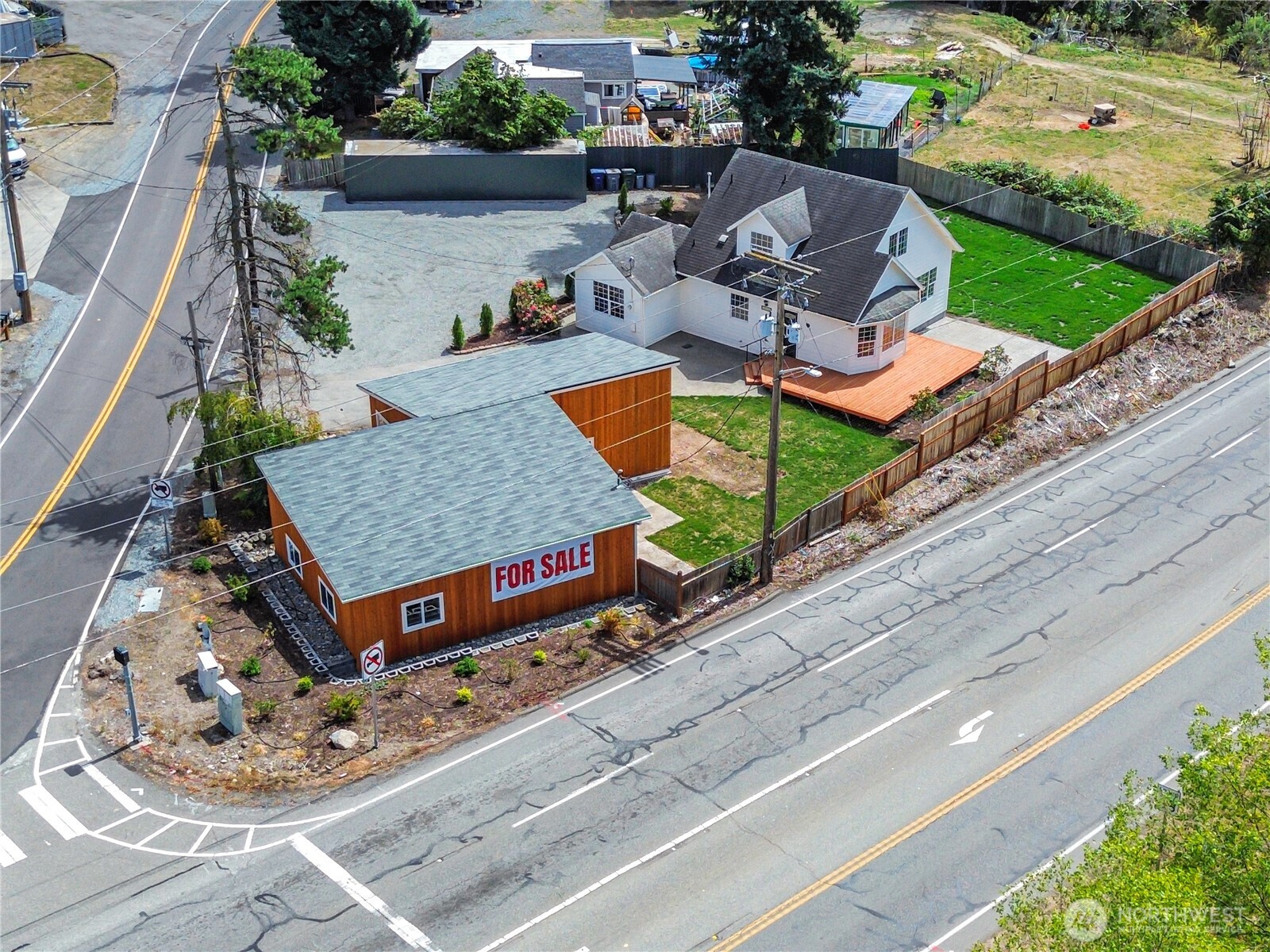 3618 Chrisella Road East Edgewood, WA 98371 - Photo 22 of 33 a aerial view of a house with garden space and sitting area