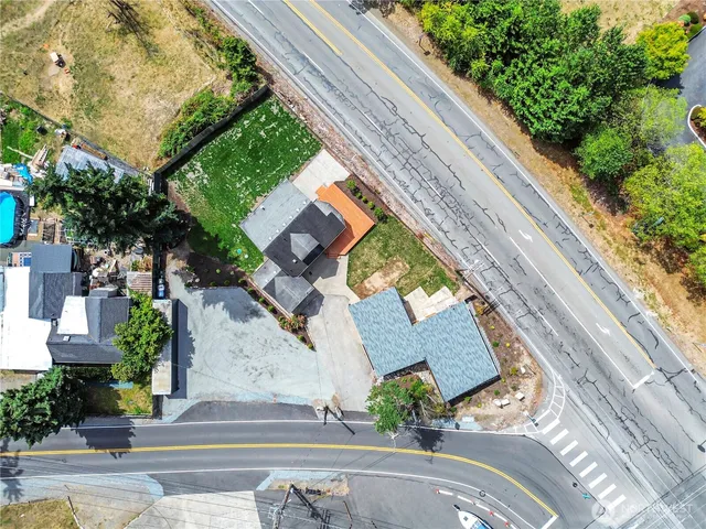 an aerial view of a house with a garden