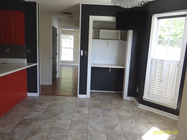 144 Old Sardis Church Road Clayton, AL 36016 - Photo 11 of 34 a view of an empty room with kitchen and a window