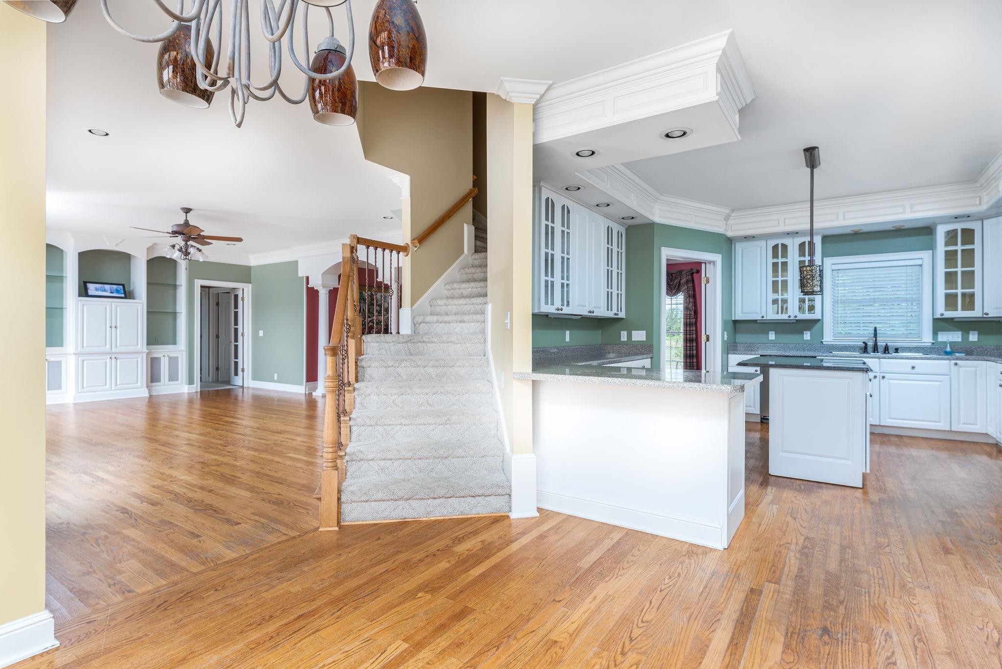 6464 Lebanon Road Murfreesboro, TN 37129 - Photo 14 of 30 a view of a kitchen and dining room with wooden floor