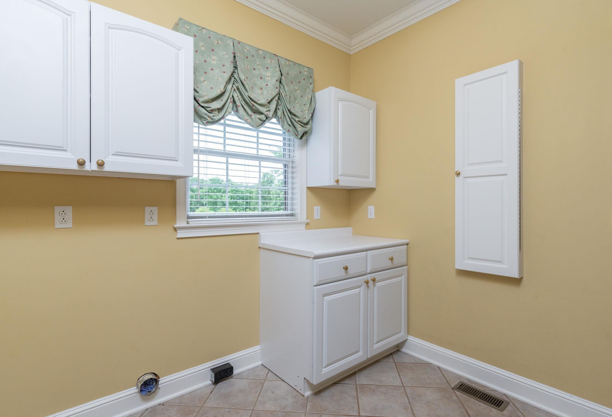 6464 Lebanon Road Murfreesboro, TN 37129 - Photo 17 of 30 a kitchen with a sink cabinets and a window