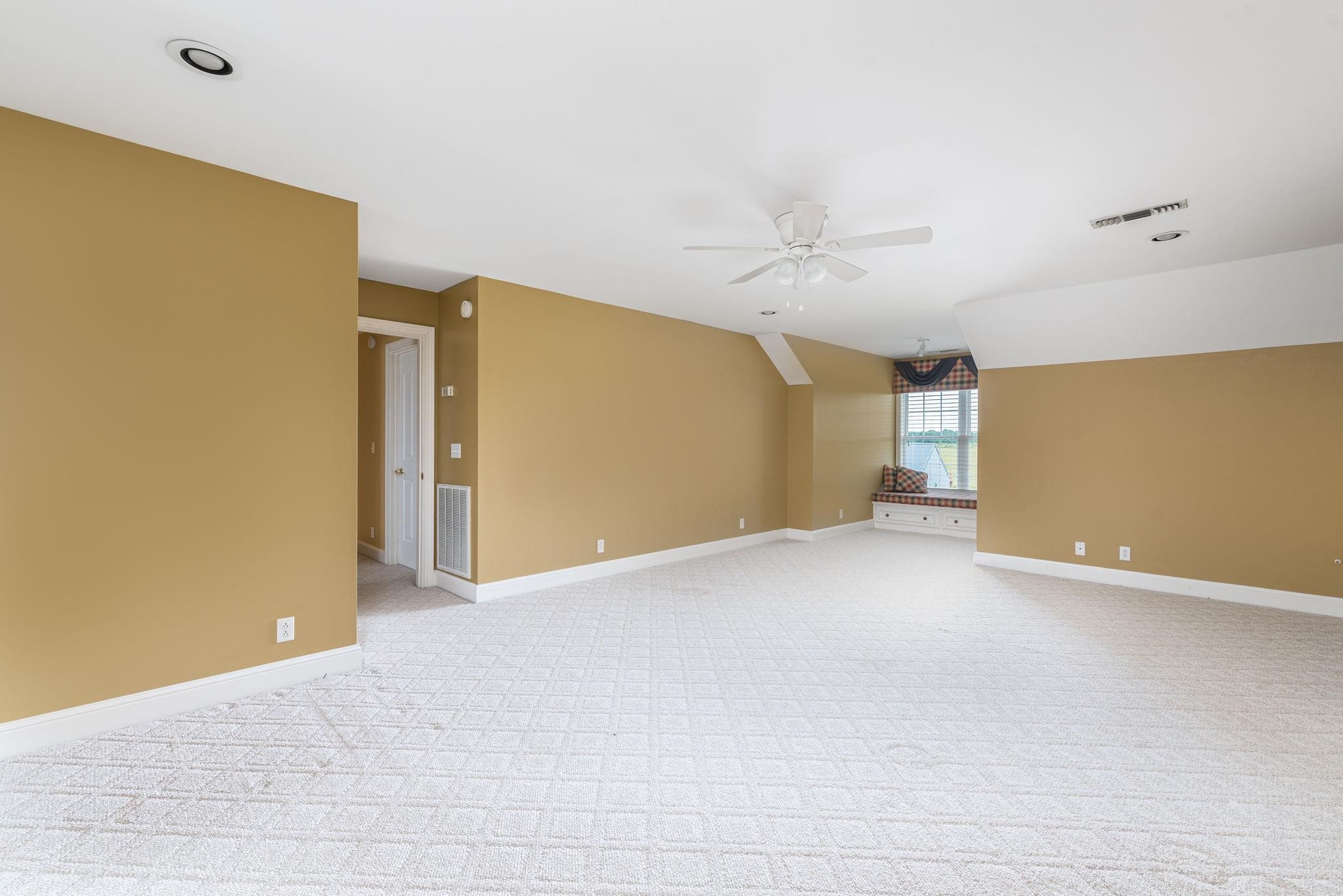 6464 Lebanon Road Murfreesboro, TN 37129 - Photo 24 of 30 a view of a big room with ceiling fan