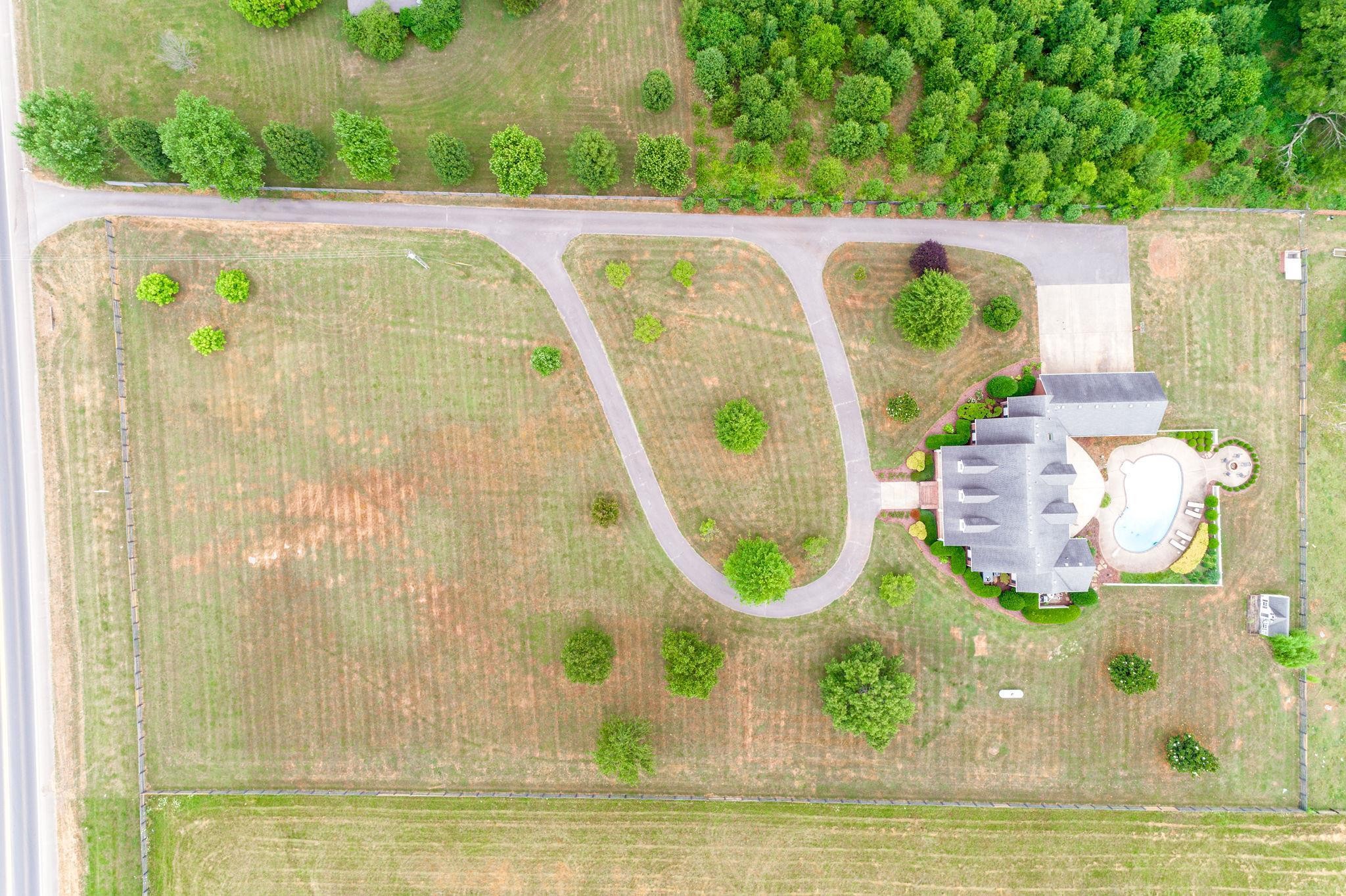 6464 Lebanon Road Murfreesboro, TN 37129 - Photo 5 of 30 a view of swimming pool with a garden