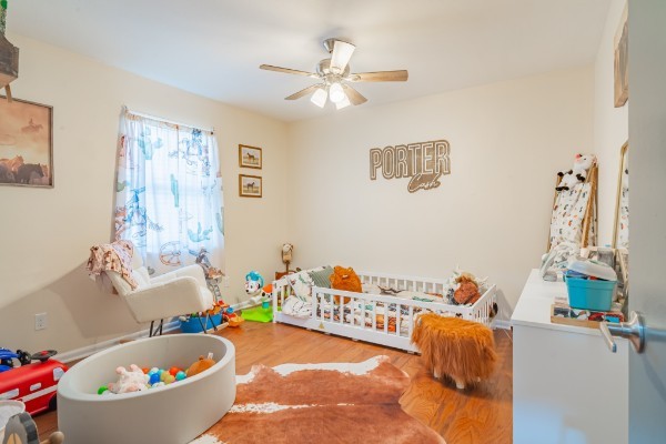 1689 Pleasant Ridge Road Huntland, TN 37345 - Photo 28 of 44 a bedroom with furniture and a chandelier
