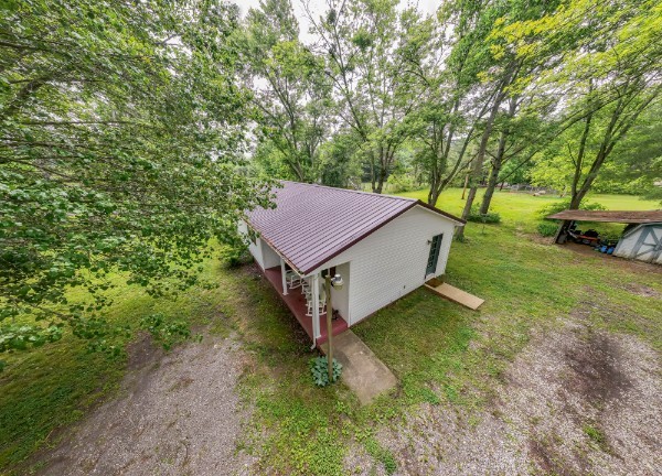 1689 Pleasant Ridge Road Huntland, TN 37345 - Photo 3 of 44 a view of a house with a yard
