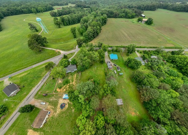1689 Pleasant Ridge Road Huntland, TN 37345 - Photo 36 of 44 an aerial view of residential houses with outdoor space and street view