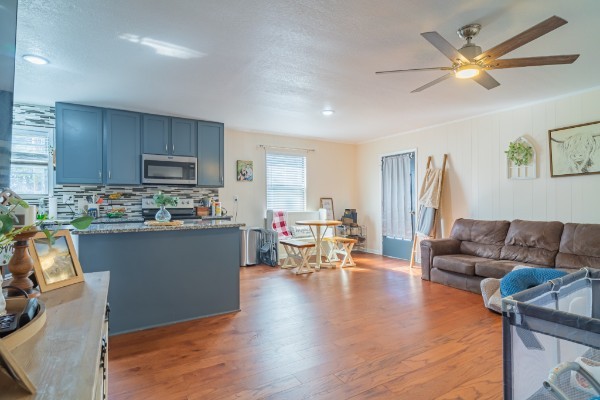 1689 Pleasant Ridge Road Huntland, TN 37345 - Photo 8 of 44 a living room with furniture and a wooden floor