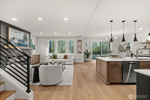 a large room with kitchen island lots of counter space