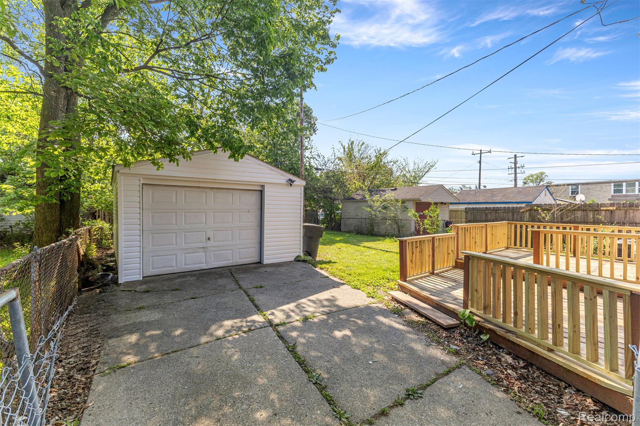 19320 Telegraph Road Detroit, MI 48219 - Photo 21 of 27 Detached garage featuring concrete driveway