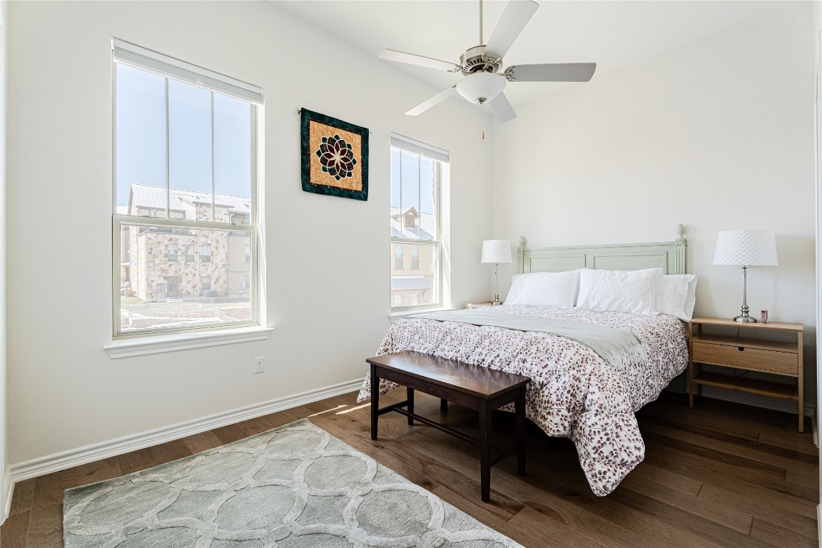 329 Adams Street Georgetown, TX 78628 - Photo 19 of 34 a bedroom with a bed and a window