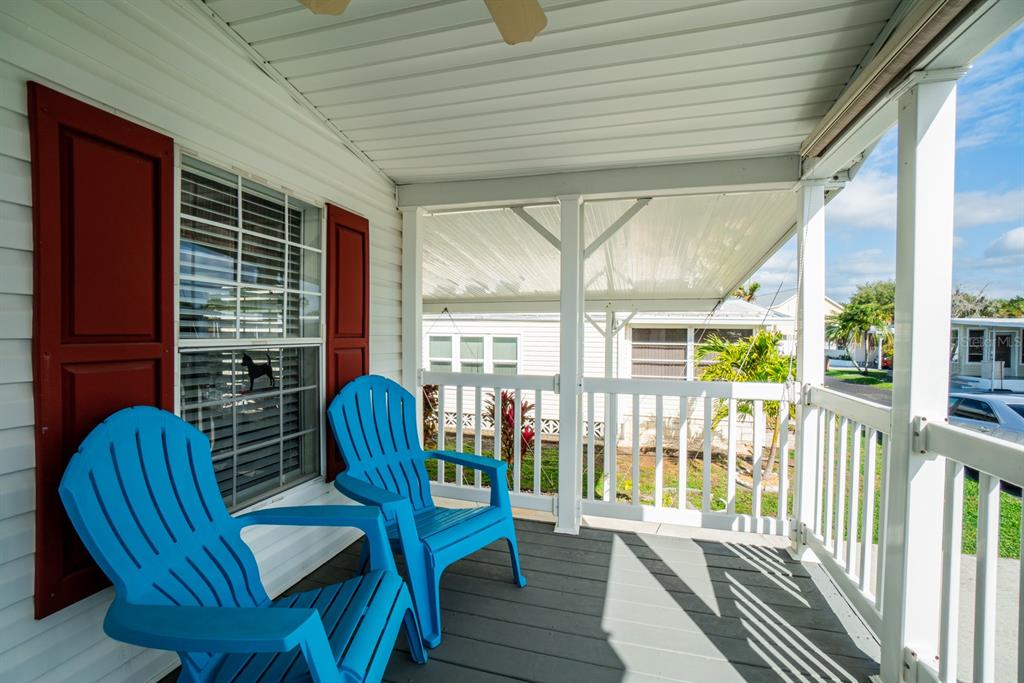 10303 Burnt Store Road, Unit 203 Punta Gorda, FL 33950 - Photo 3 of 41 a view of a porch with furniture
