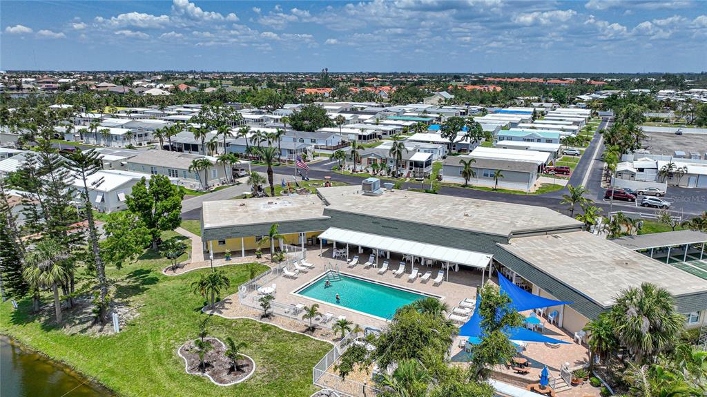 10303 Burnt Store Road, Unit 203 Punta Gorda, FL 33950 - Photo 39 of 41 an aerial view of a house with a garden