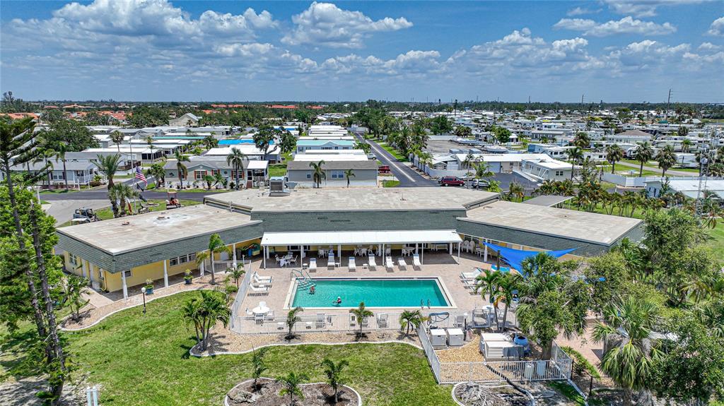 10303 Burnt Store Road, Unit 203 Punta Gorda, FL 33950 - Photo 40 of 41 an aerial view of multiple house