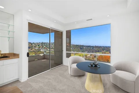 a large bathroom with a large tub and sink