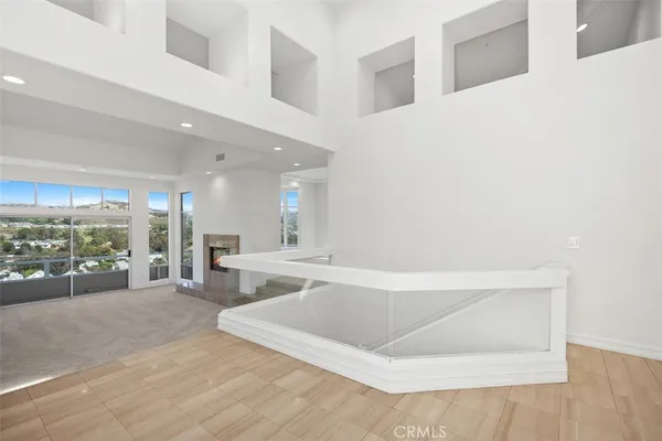 a dining room with a table and chairs