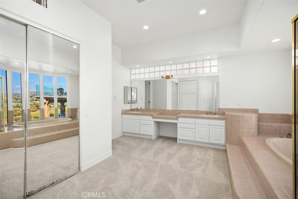 4 Tesoro San Clemente, CA 92673 - Photo 34 of 60 a large bathroom with a large tub and sink