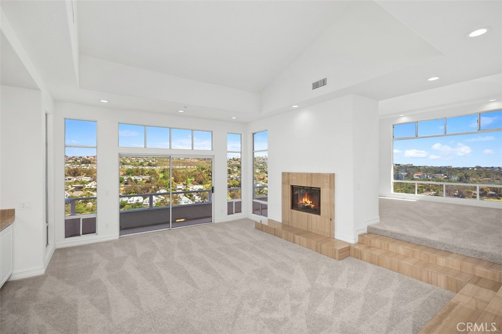 4 Tesoro San Clemente, CA 92673 - Photo 8 of 60 a view of a livingroom with an empty space and a fireplace
