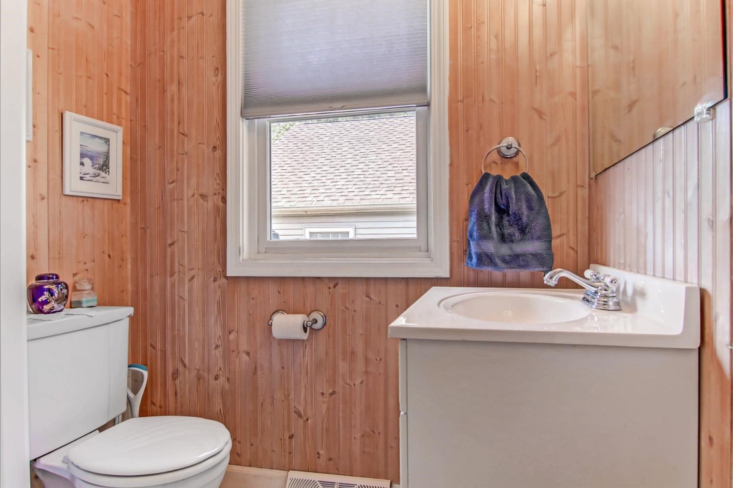 3115 Ridge Road Highland, IN 46322 - Photo 13 of 33 a bathroom with a sink toilet and a window