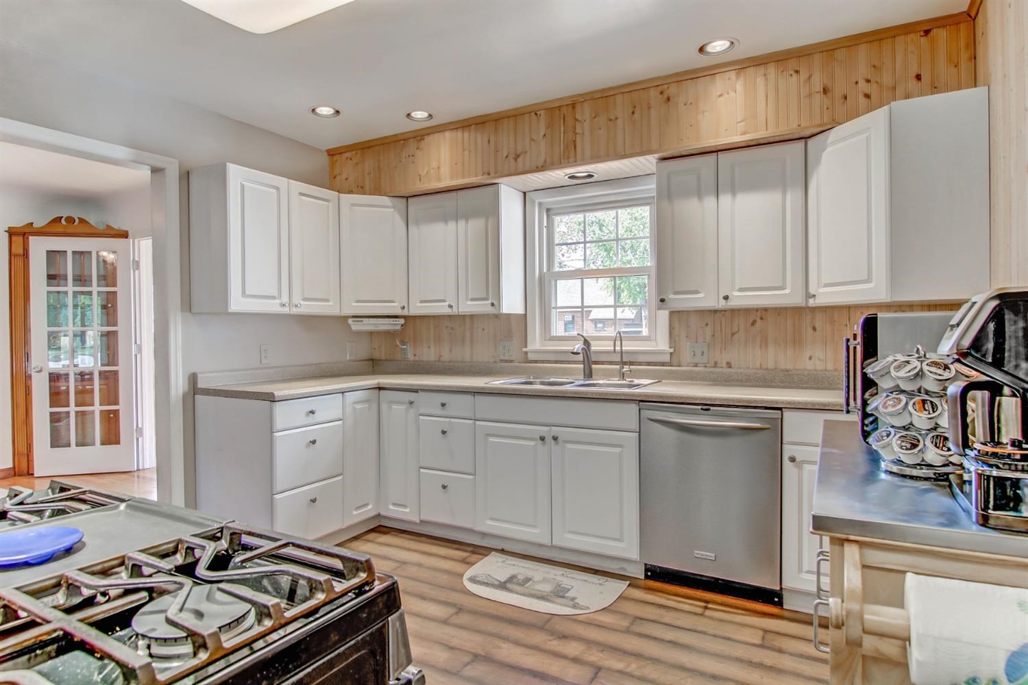 3115 Ridge Road Highland, IN 46322 - Photo 18 of 33 a kitchen with a stove a sink and a window