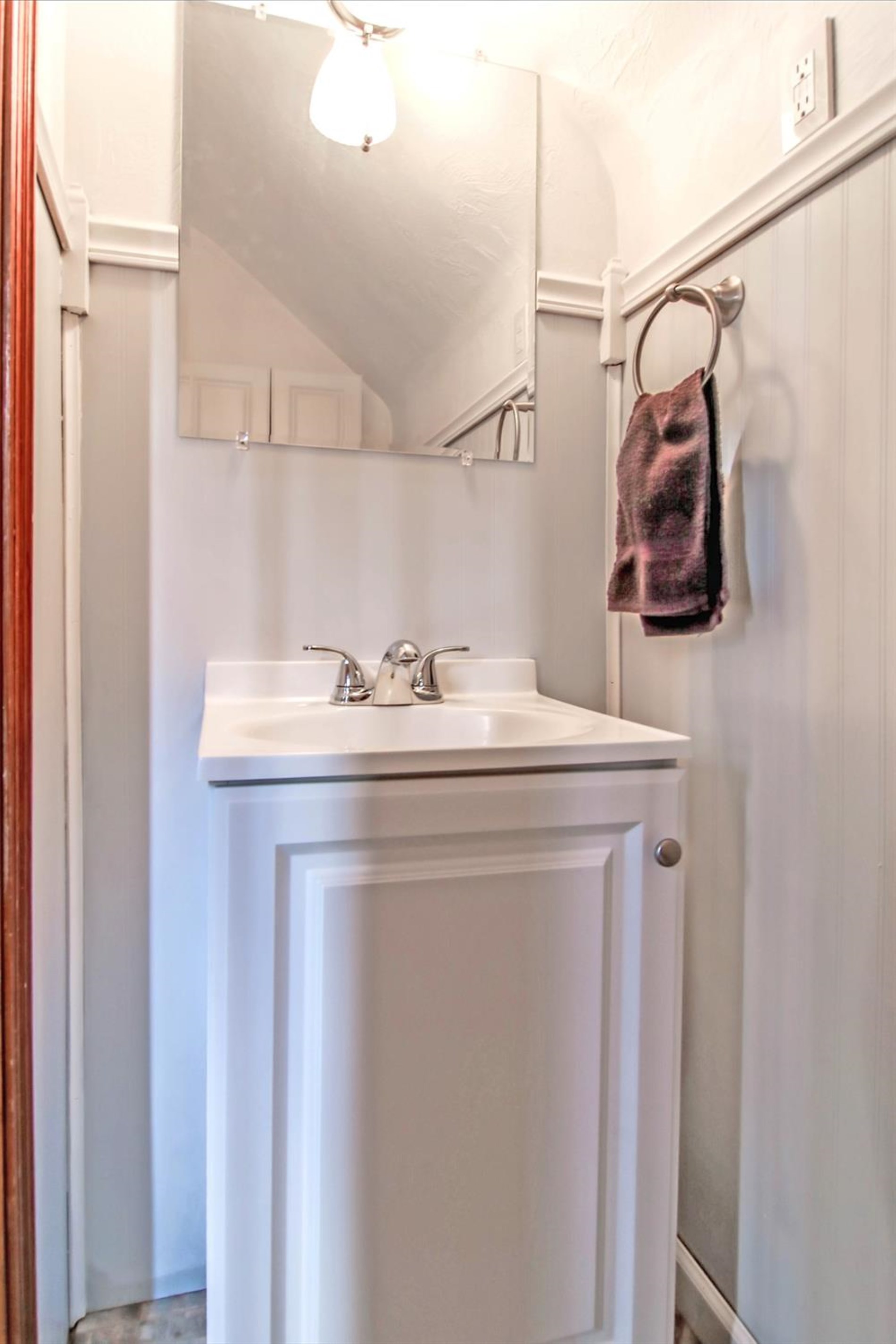 3115 Ridge Road Highland, IN 46322 - Photo 26 of 33 a bathroom with a sink and a mirror