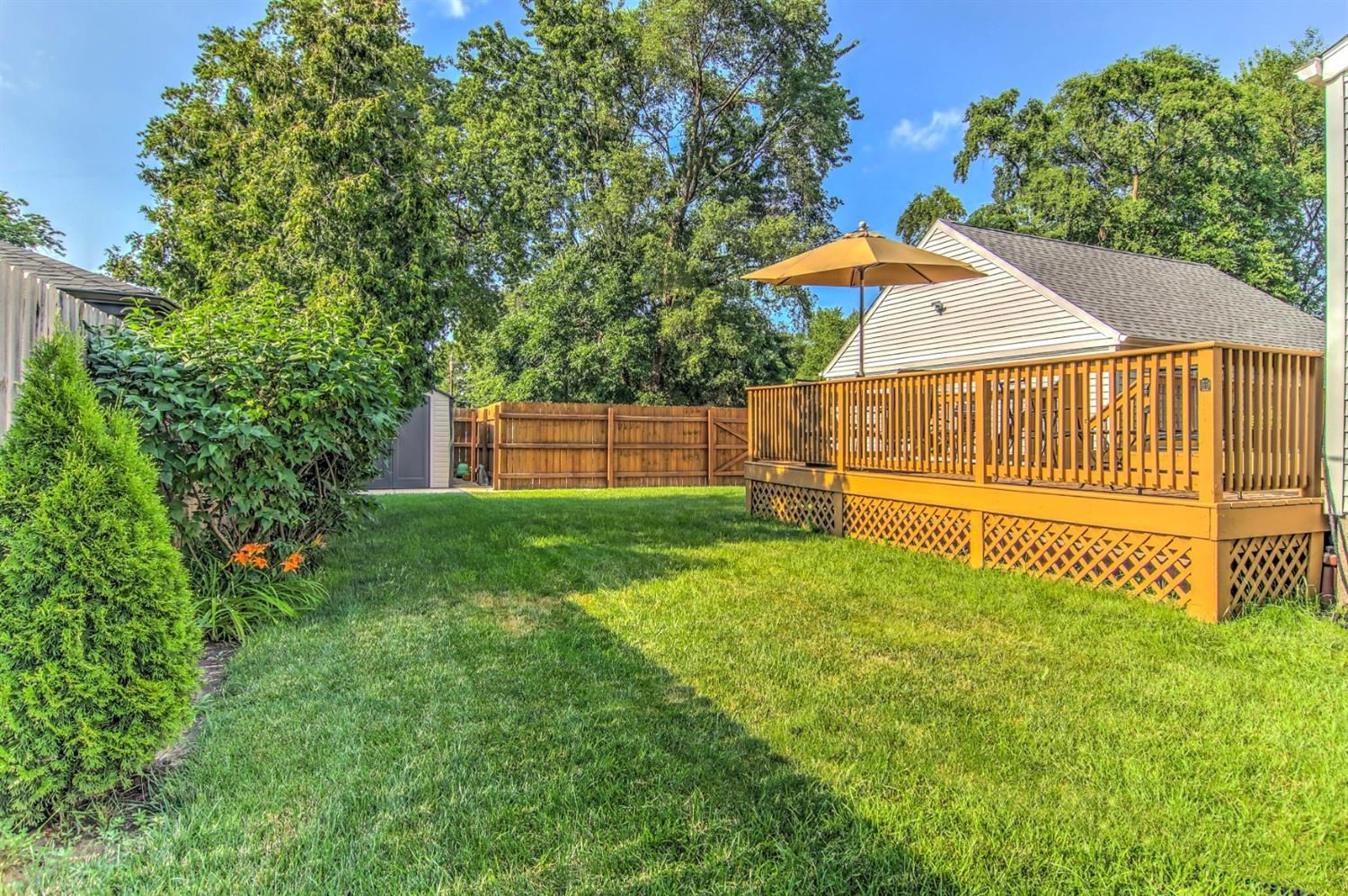 3115 Ridge Road Highland, IN 46322 - Photo 4 of 33 a backyard of a house with table and chairs