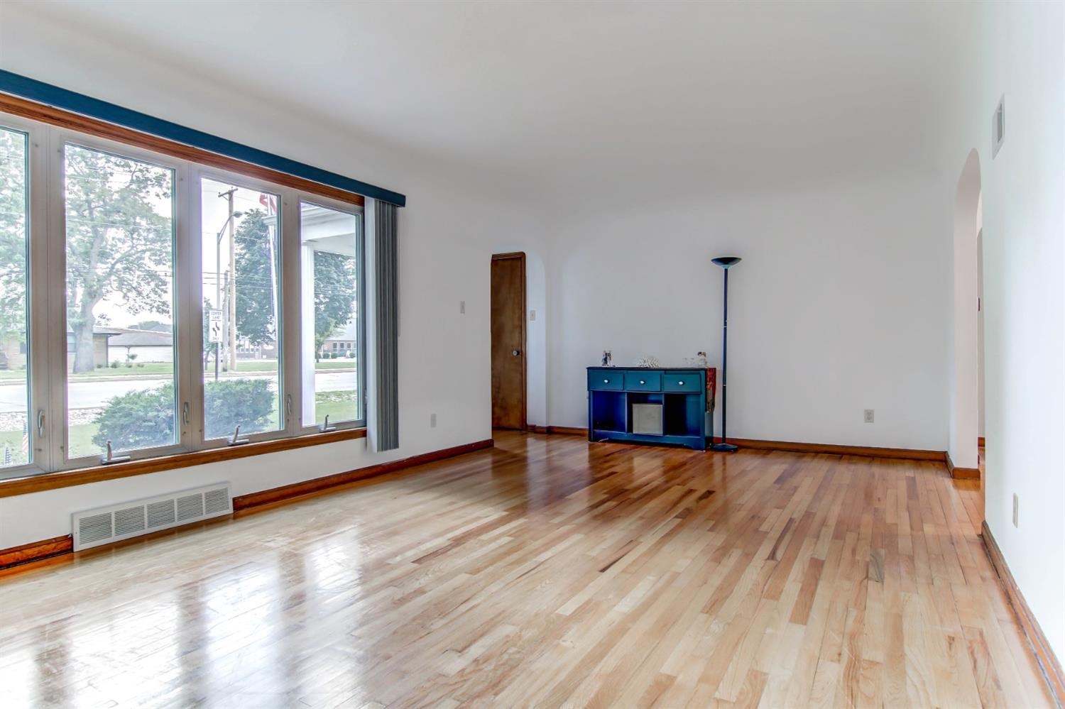 3115 Ridge Road Highland, IN 46322 - Photo 7 of 33 a view of empty room with wooden floor and fan