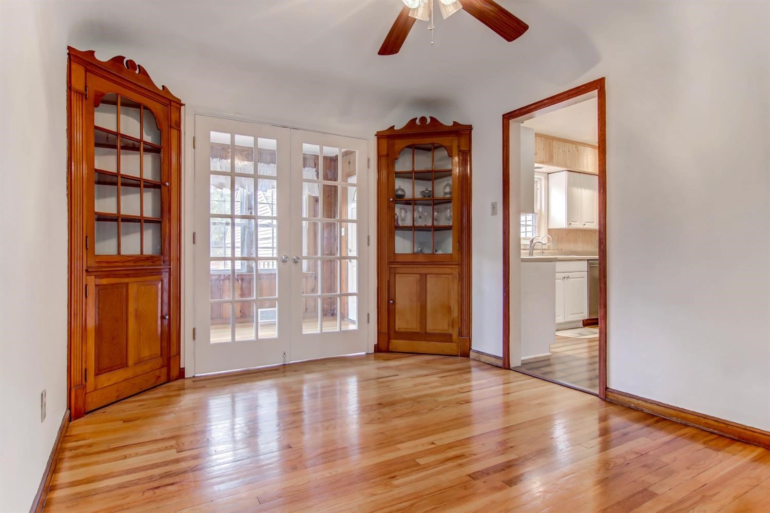 3115 Ridge Road Highland, IN 46322 - Photo 9 of 33 an empty room with wooden floor closet and windows