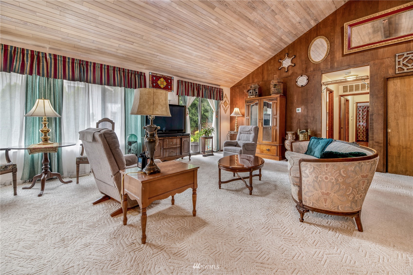 17315 Clover Road Bothell, WA 98012 - Photo 10 of 24 a living room with furniture a rug and a large window